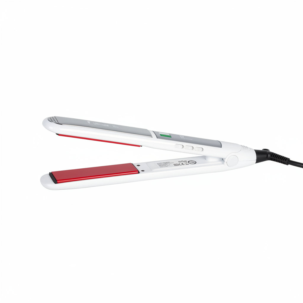 Hair straightener with red heating element on a white background